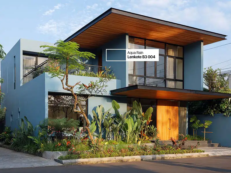 Cat dusty blue memberikan kesan sejuk dan ramah pada eksterior rumah